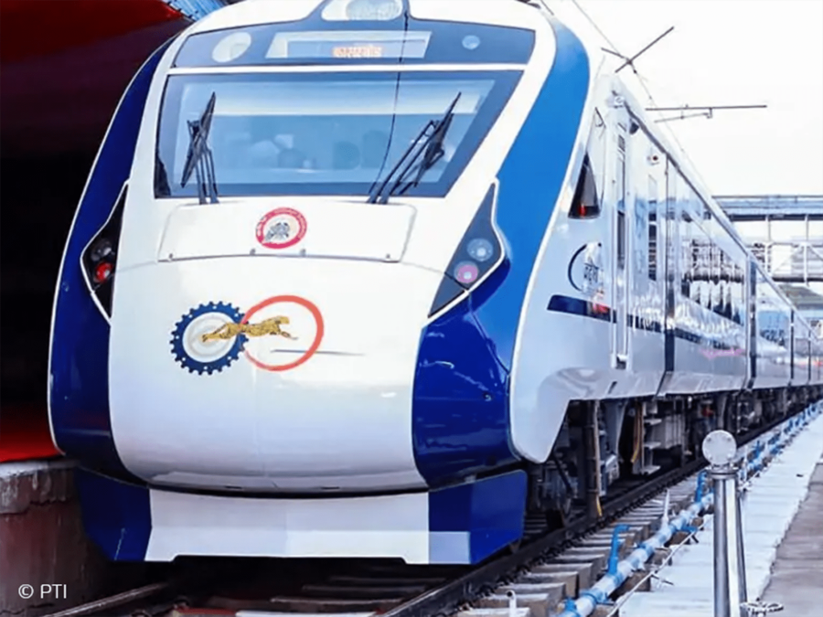 Vande Bharat train at platform – sleeping car unit representing bogie design validation project in India.